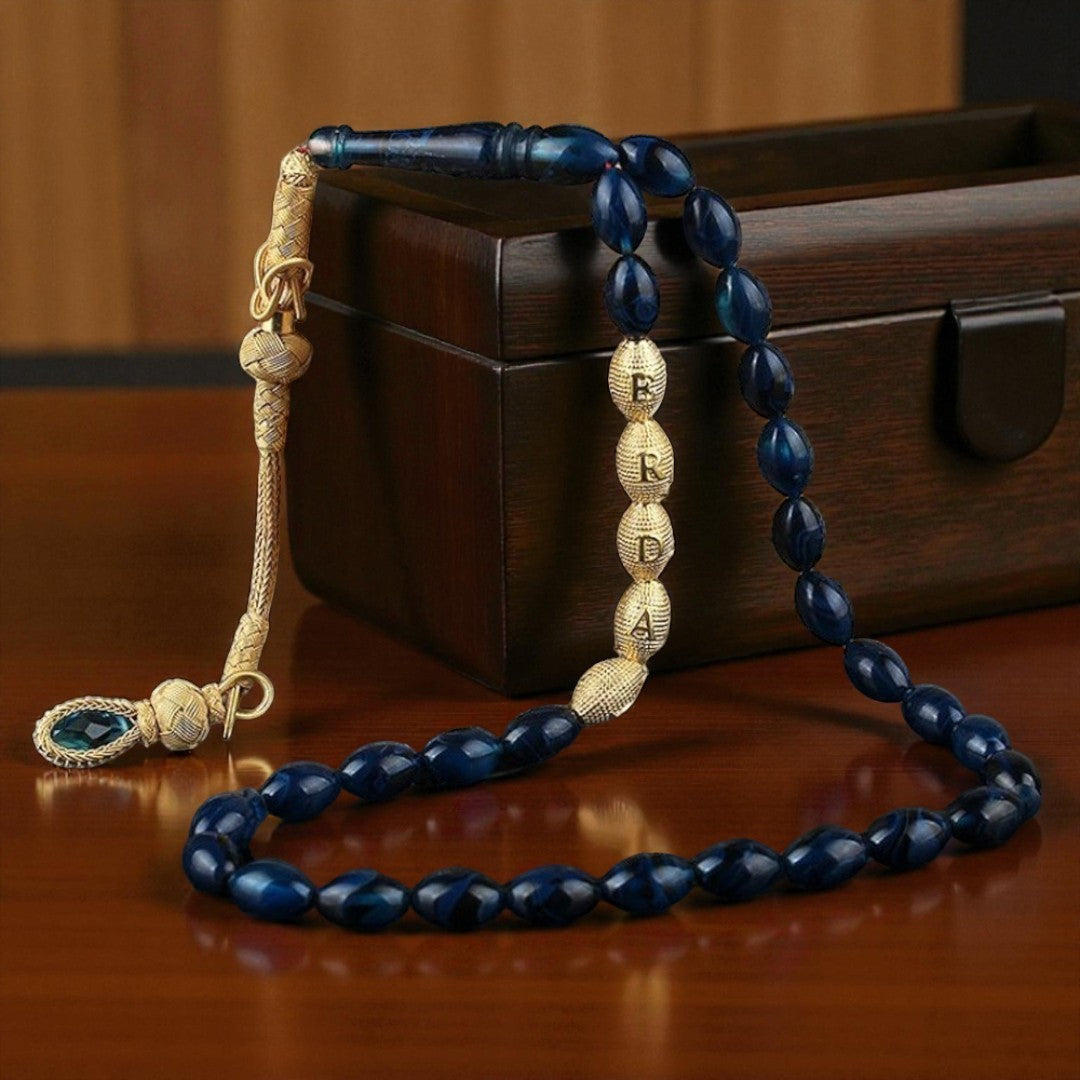 Navy blue amber named rosary and note written wooden box