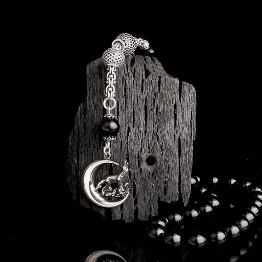 Gebetskette aus Feuerbernstein mit 925er Silber, Halbmond-Wolf-Design & Quaste