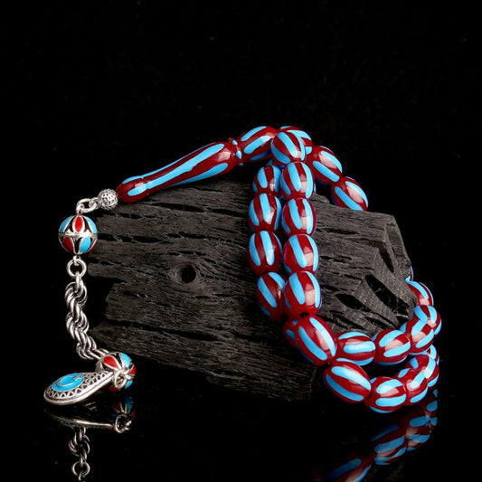 Gebetskette aus Bernstein mit 925er Silber, emaillierter Quaste & Rot-Blauem Halbmond-Stern-Design