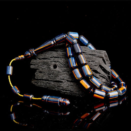 Gebetskette aus Kampferholz mit System & Kapselschliff-Design