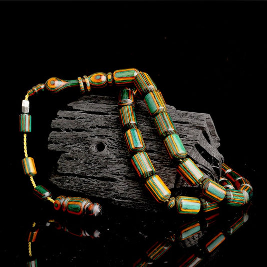 Gebetskette aus Kampferholz mit System & Kapselschliff-Design