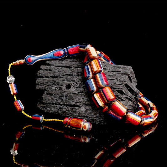 Gebetskette aus Kampferholz mit System & Kapselschliff-Design