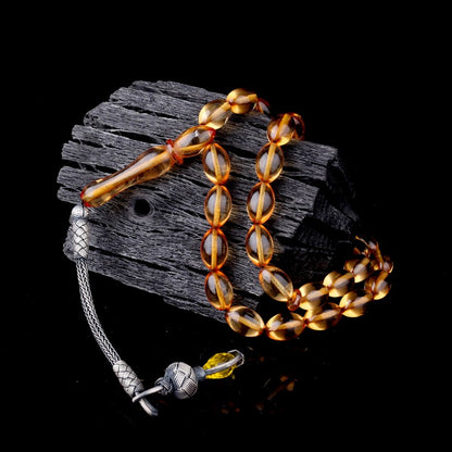 1000 Ayar Gümüş Püsküllü Arpa Kesim Ateş Kehribar Tesbih