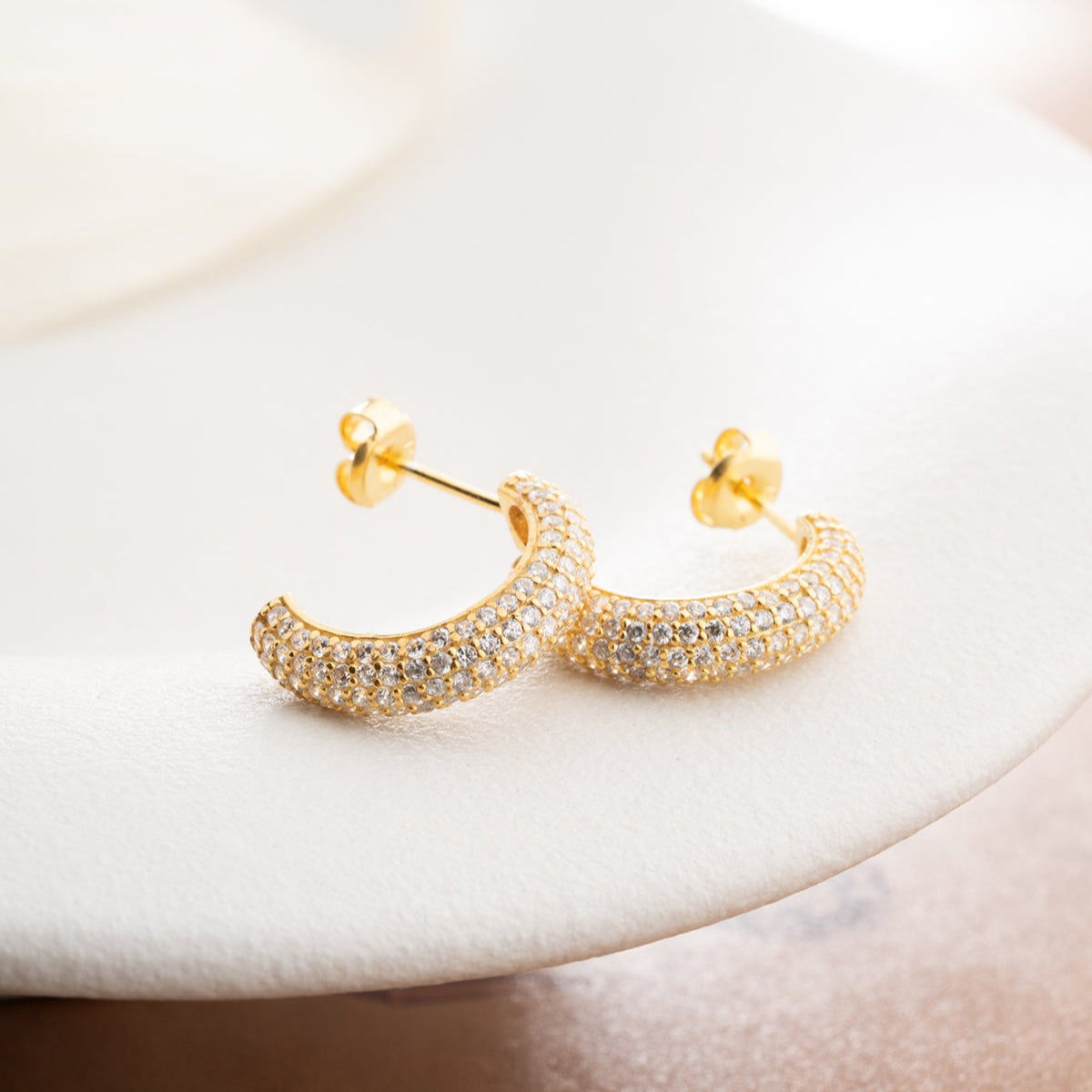 Half -ring earrings