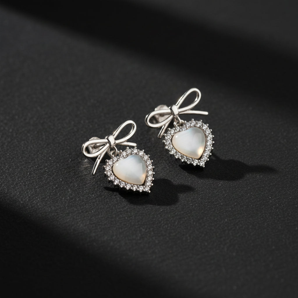 Silver color earrings with heart stone
