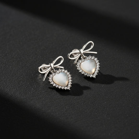Boucles d'oreilles de couleur argentée avec pierre de cœur
