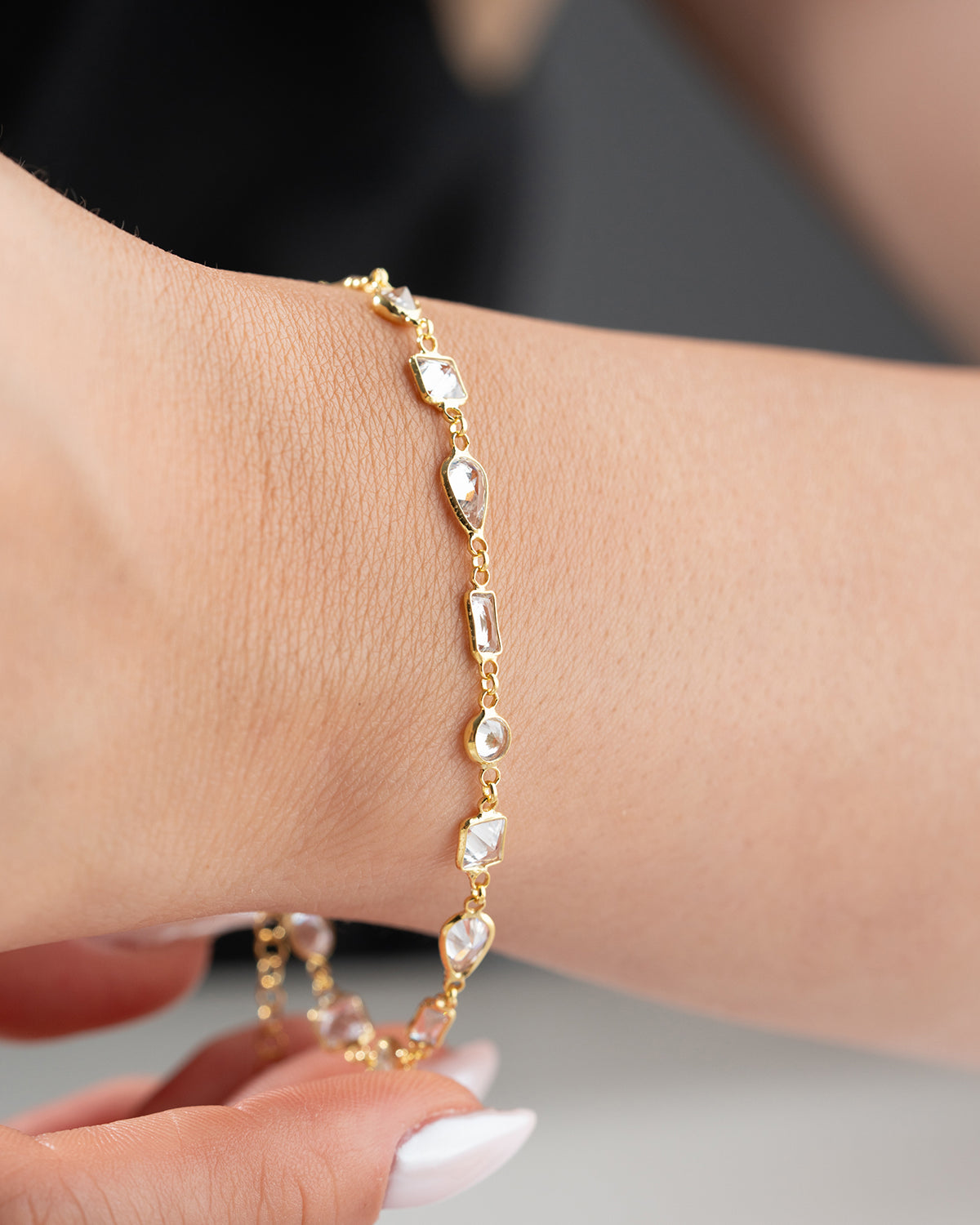 Elegant geometric stone detailed gold plated bracelet