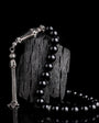 Globe cut black zircon stone fire amber rosary