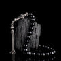 Globe cut black zircon stone fire amber rosary