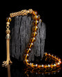 Globe cut black zircon stone fire amber rosary