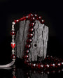 Red Facet Cut Drop Amber Rosary