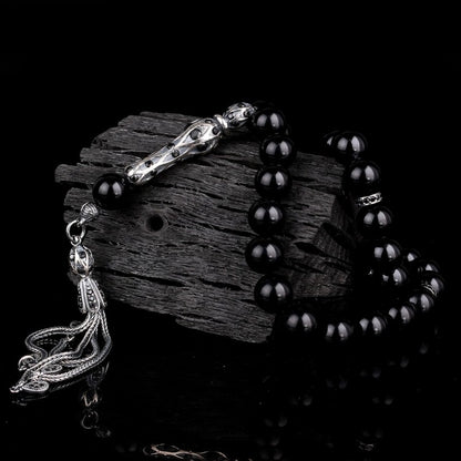 Globe cut black zircon stone fire amber rosary
